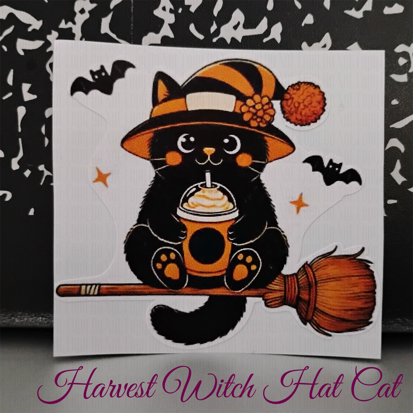 Black cat in striped witch hat on broom with latte - spooky cute sticker
