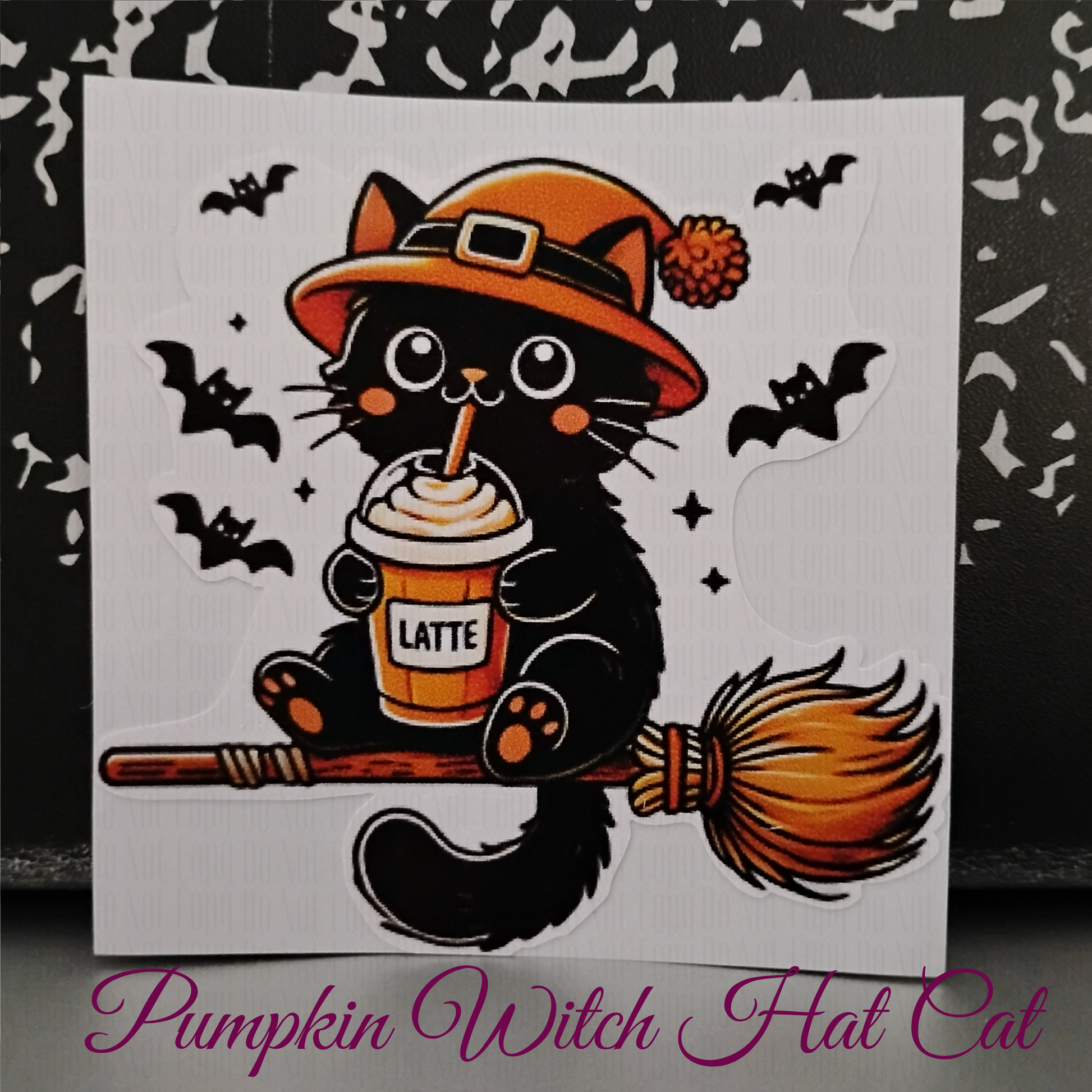black cat in pumpkin witch hat on broom with latte - spooky cute sticker